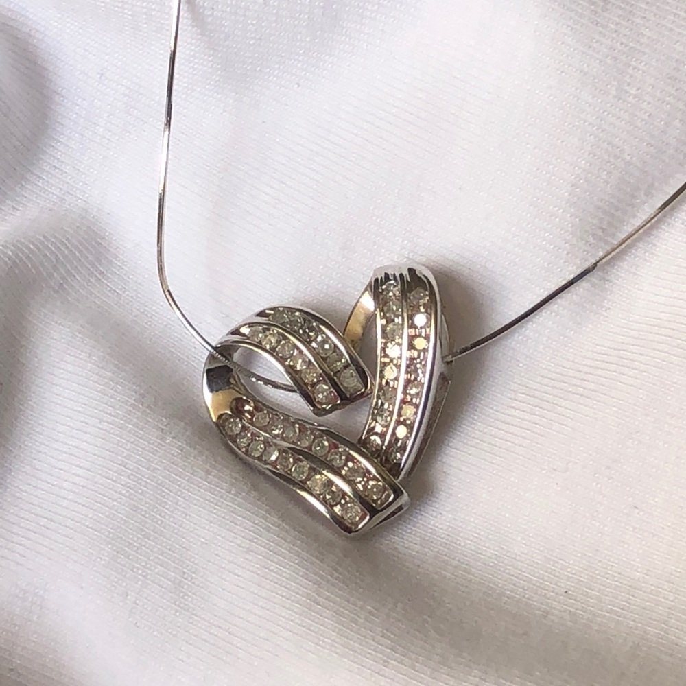 Diamonds gold heart pendent with rob chain $299
